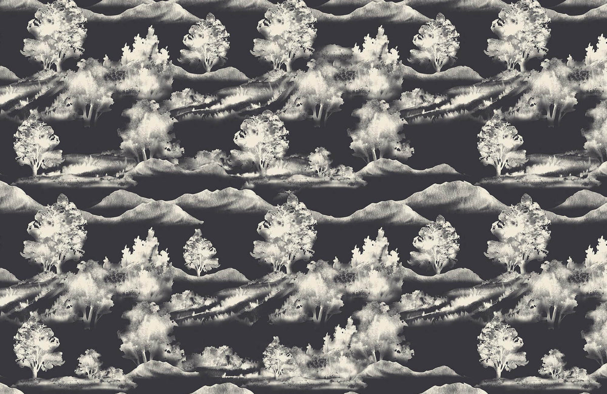 Monochrome scenic wallpaper with trees and mountains in repeating pattern, creating a dramatic and artistic landscape design backdrop.