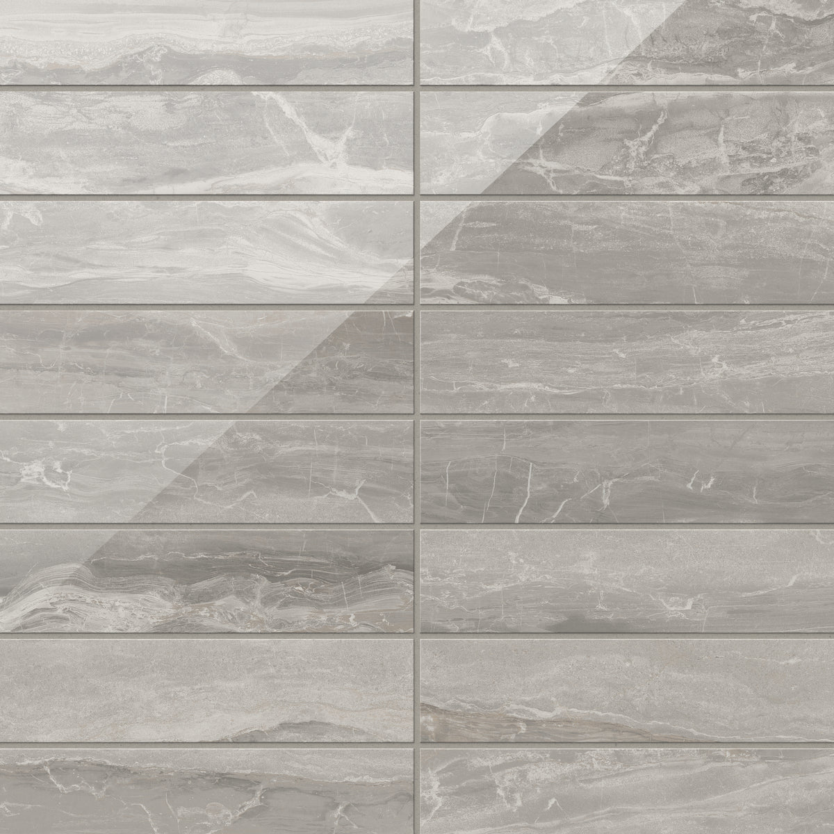 With flowing veining and a polished taupe surface, these 3x12 tiles merge earthy tones with a lustrous sheen, creating a stylish and sophisticated design.