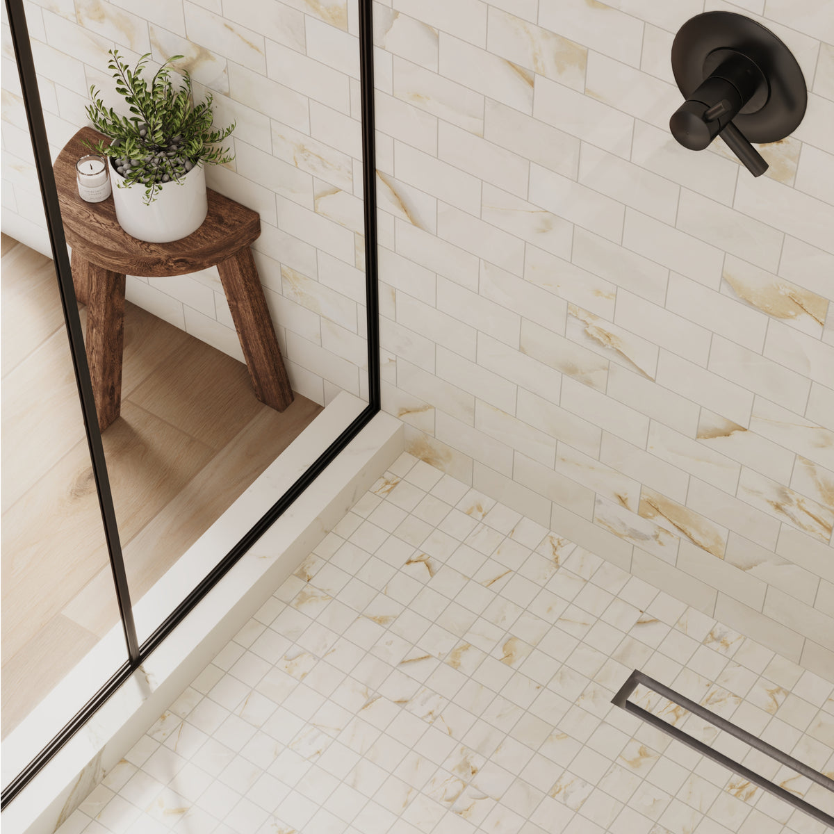 An opulent bathroom blending natural and contemporary elements, with floors elegantly clad in Preston 8x48 Birch, a wood-look porcelain tile evoking the grace of natural timber. Walls are adorned with Astrid 3x6 Alabaster, an onyx-look matte porcelain mosaic tile, casting a sophisticated, luminous ambiance. The shower floor is graced by Astrid 2x2 Alabaster tiles, their matte finish and onyx inspiration offering a harmonious balance of luxury and tranquility.