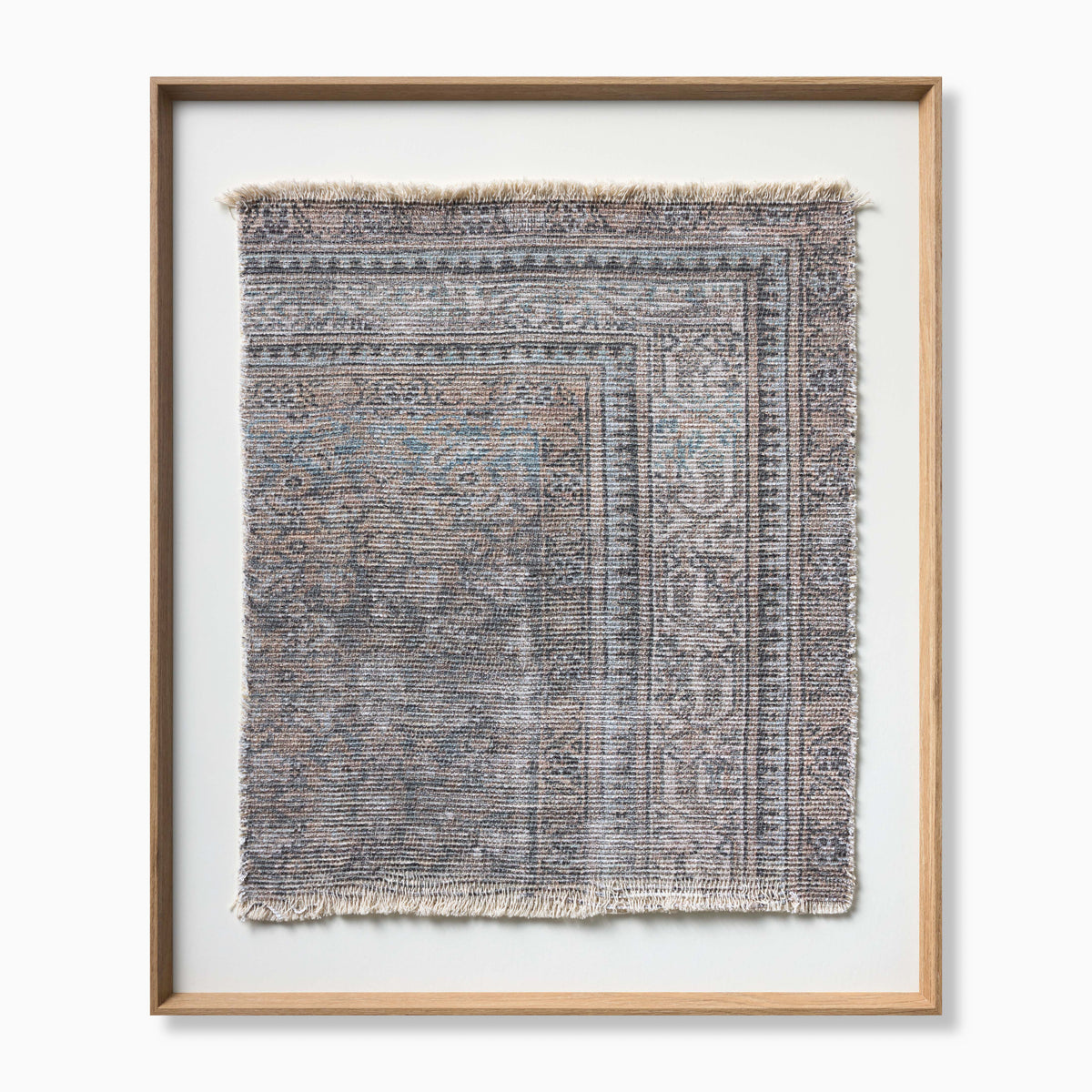 Distressed textile wall art with layered ornamental patterns in warm off-white, taupe, dark gray, and subtle hints of dusty blue.