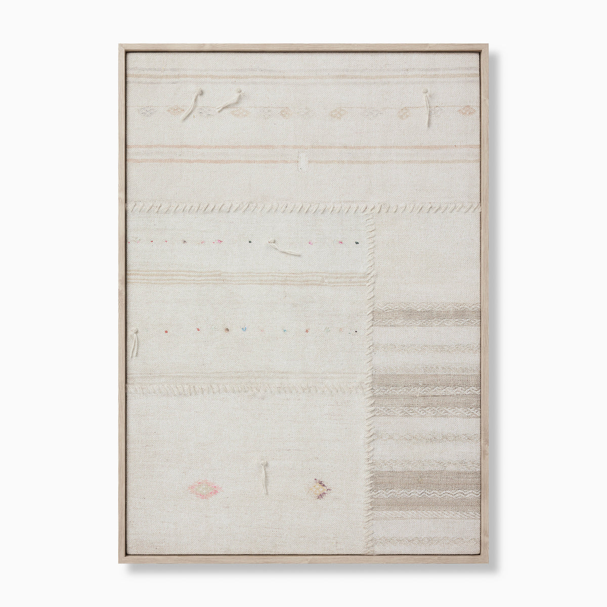 Vertical framed textile artwork featuring hand-stitched panels with subtle stripes, woven details, and soft pops of color on a neutral base.