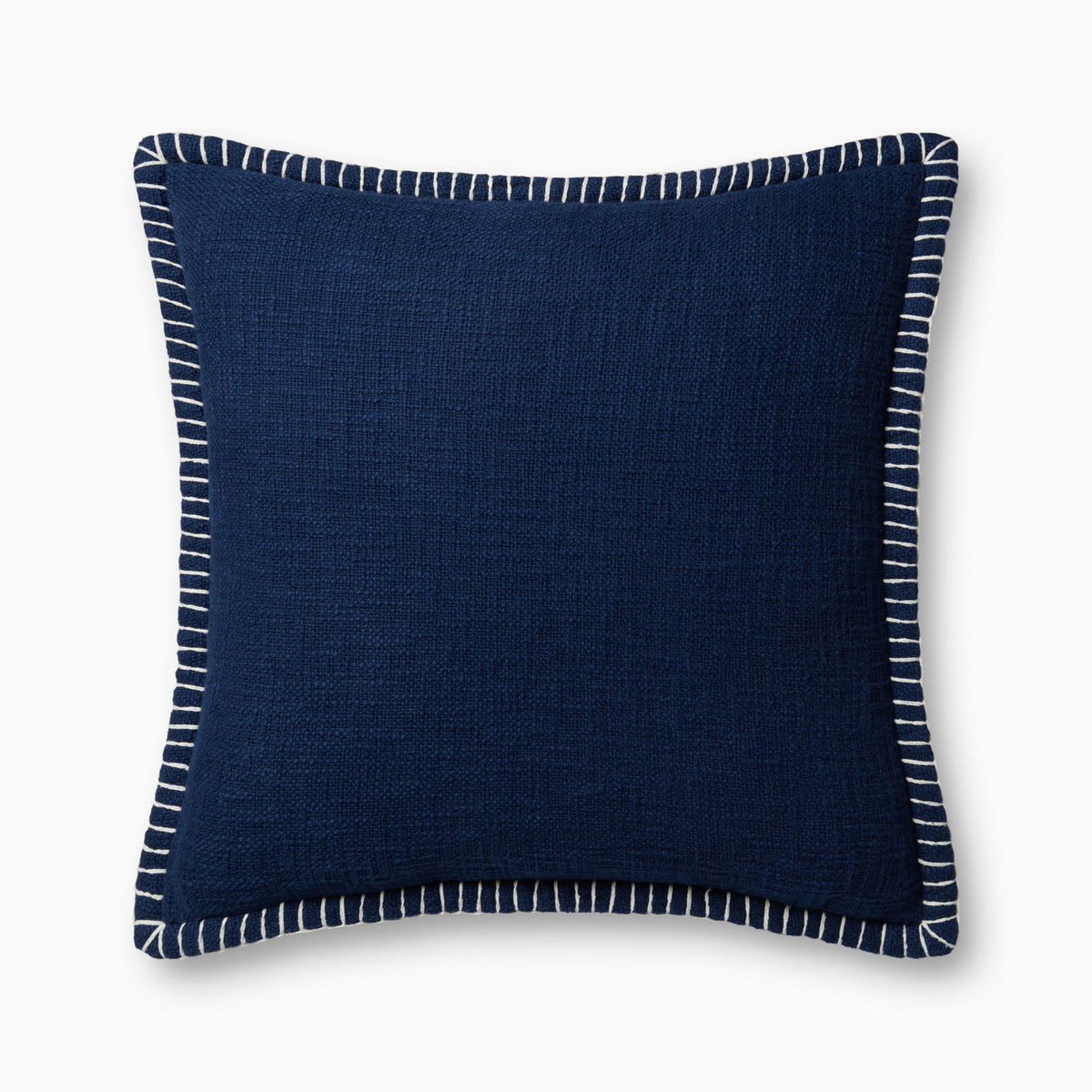This dark blue pillow features a richly textured weave, white whipstitched flange edges, and an antique bronze zipper tucked behind a tailored flap, finished for breathable cotton comfort.