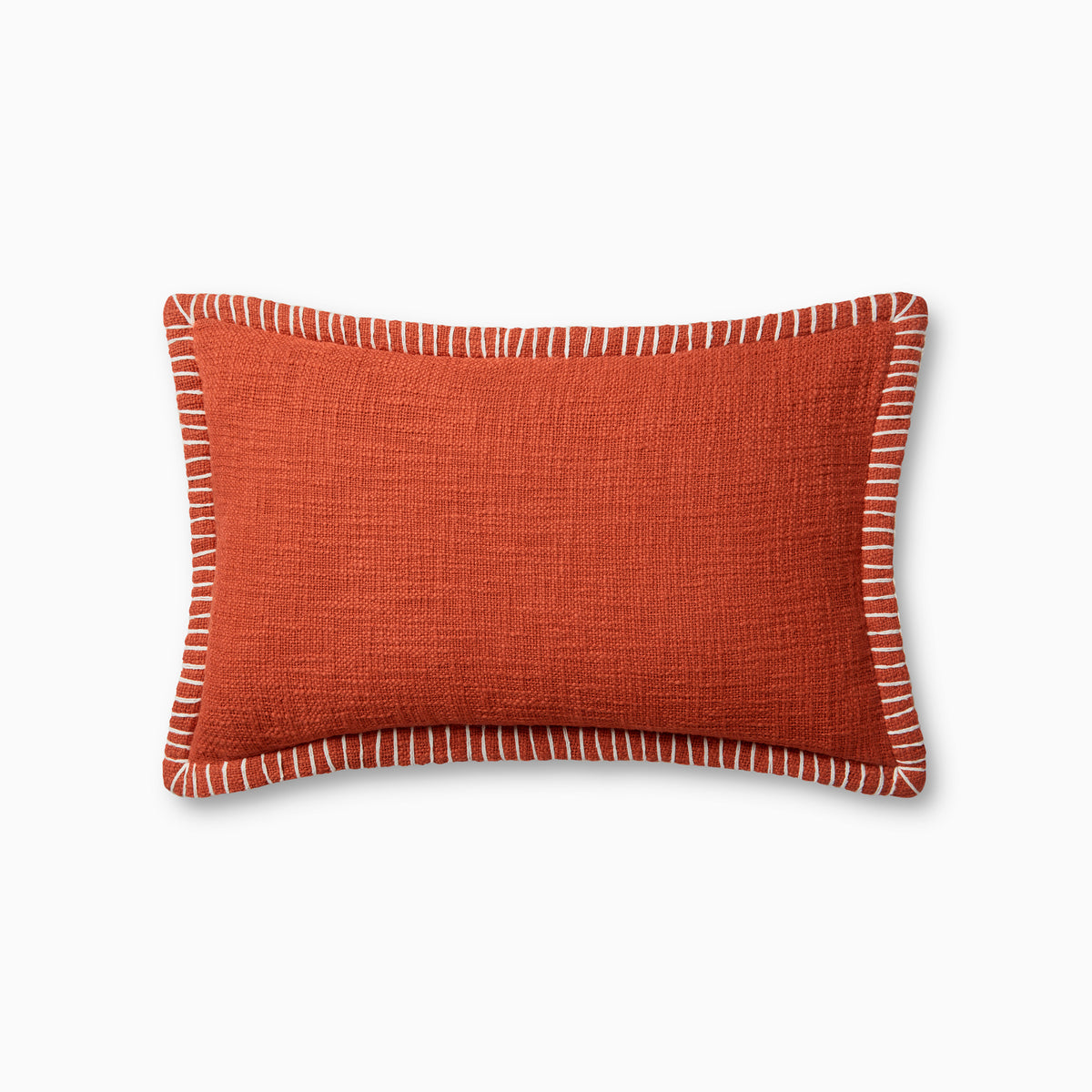 A rectangular orange pillow featuring a richly textured weave, white whipstitching at the flange edge, and an antique bronze zipper hidden behind a tailored flap, with a breathable cotton finish.