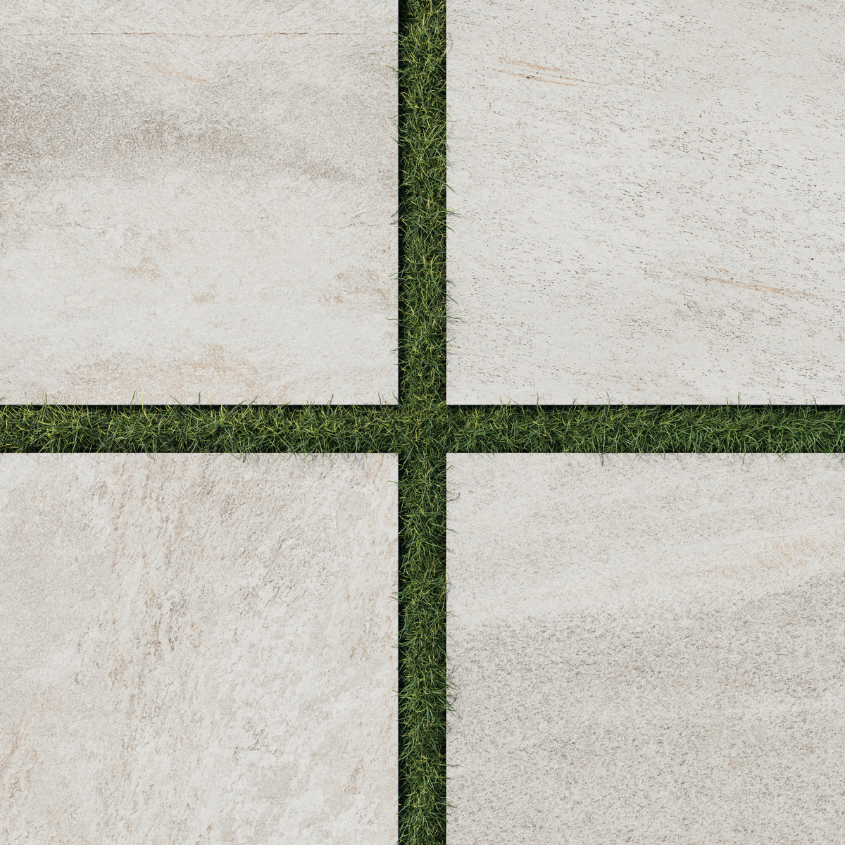 Carter Stone 24x24 Matte Porcelain Pavers, 2cm thick, featuring beige stone-like patterns with a seamless integration into grassy outdoor spaces.