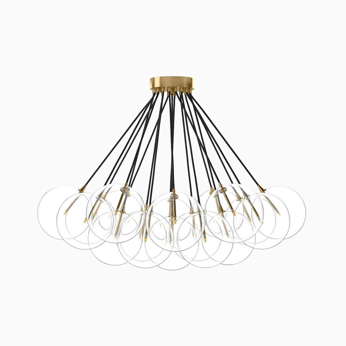Modern chandelier with burnished brass canopy and clear glass globes hanging from black cords in a sculptural array.