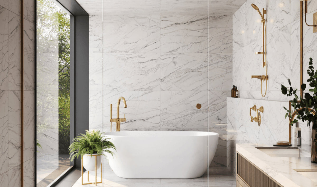 Opulent bathroom featuring 24x48 marble-look tiles with golden fixtures