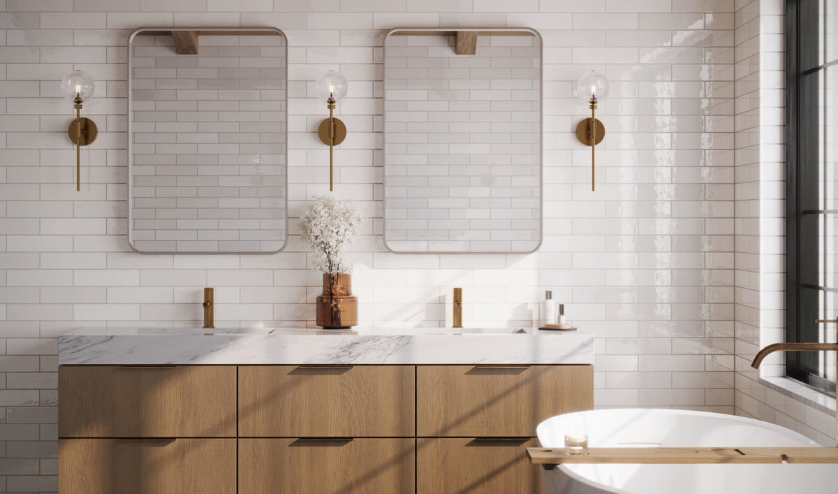 Bright bathroom featuring white subway tiles, wood accents, and chic gold fixtures for a modern yet warm feel