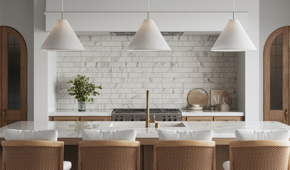 Luxury kitchen with marble-look subway tile, showcasing opulent elegance with a sophisticated, timeless design.