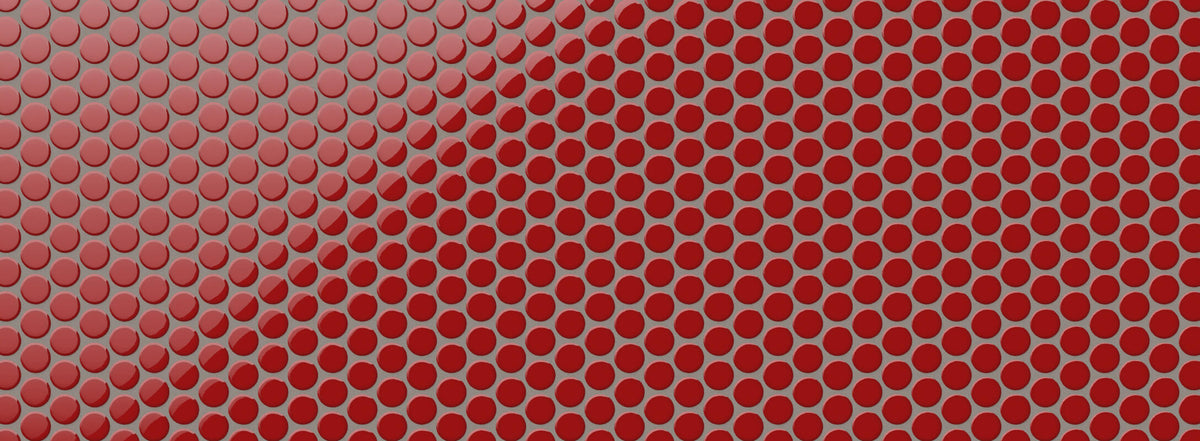 Glossy red penny round mosaic tiles with a vibrant finish, ideal for creating a bold and modern kitchen backsplash
