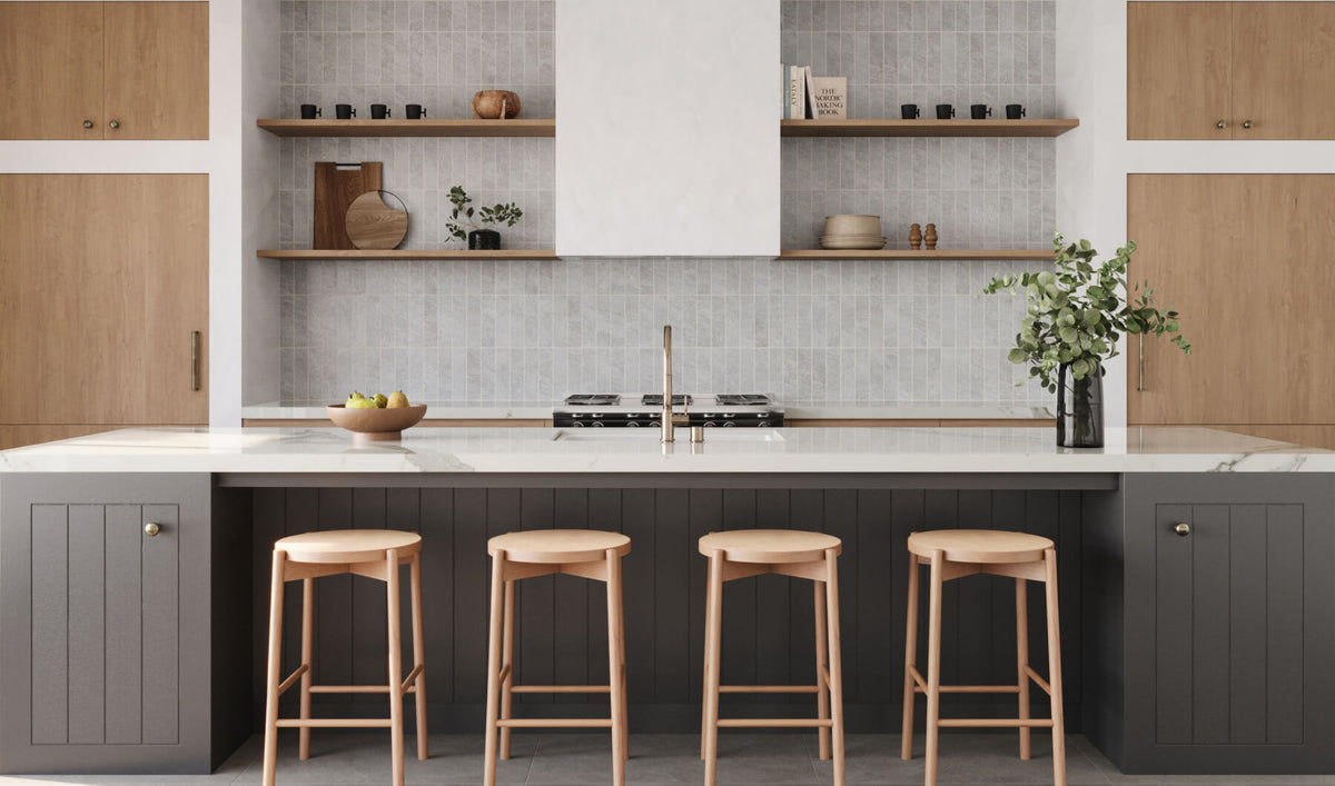 Modern kitchen featuring vertical brick look tiles in soft gray, creating a sleek and contemporary backsplash