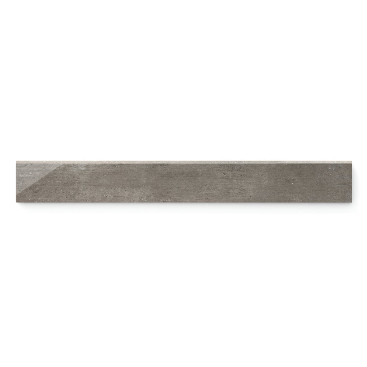 Polished Ramsey 3x24 bullnose tile, featuring a sleek, modern concrete texture for refined wall and floor transitions