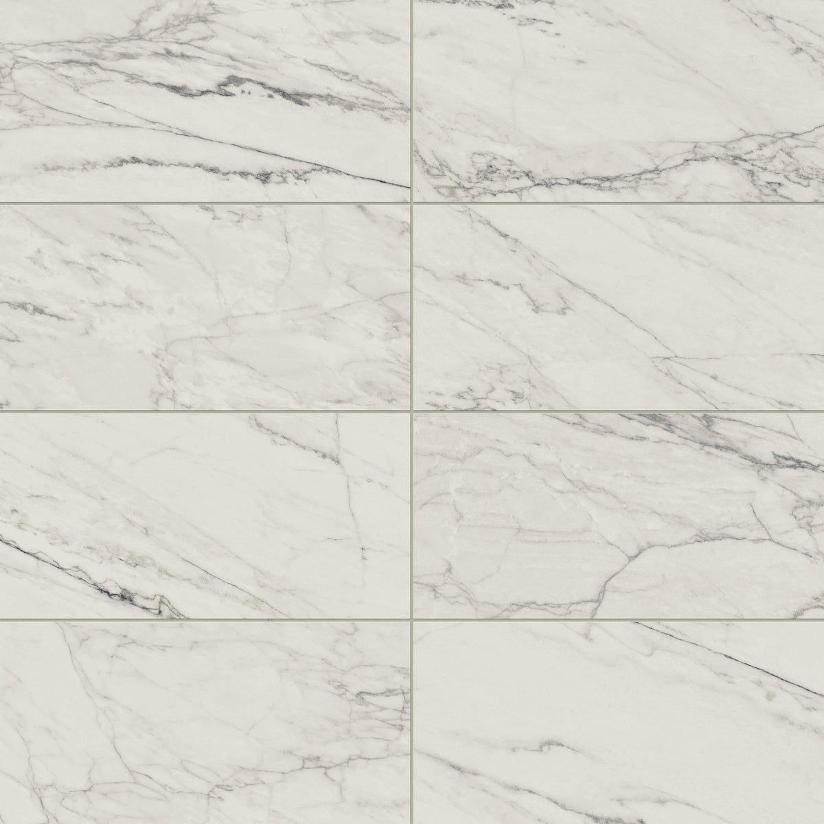 Matte Calacatta Quarzite porcelain marble look tile in 12x24 format, showcasing light grey veining on a white surface for a subtle, modern look.