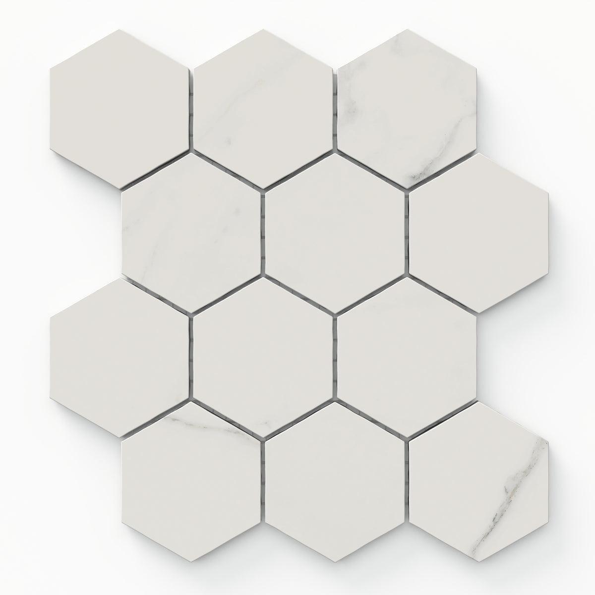 Leona Calacatta 3x3 hexagon mosaic tile in a matte finish, showcasing soft white tones with subtle gray veining for timeless elegance.