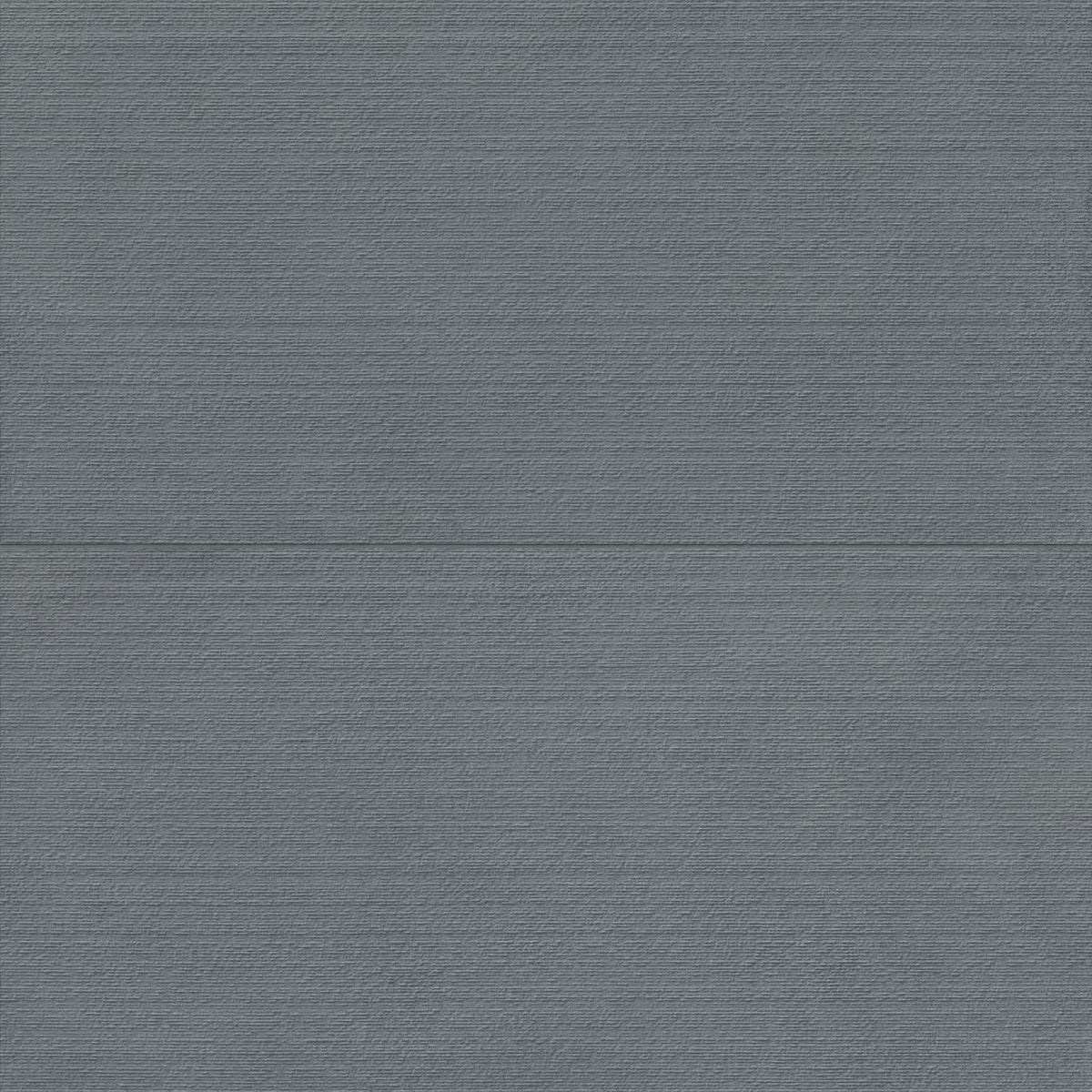 Palmer 24x48 chiseled porcelain tile in ocean blue, displaying a rich blue texture with linear details for a bold, modern aesthetic.