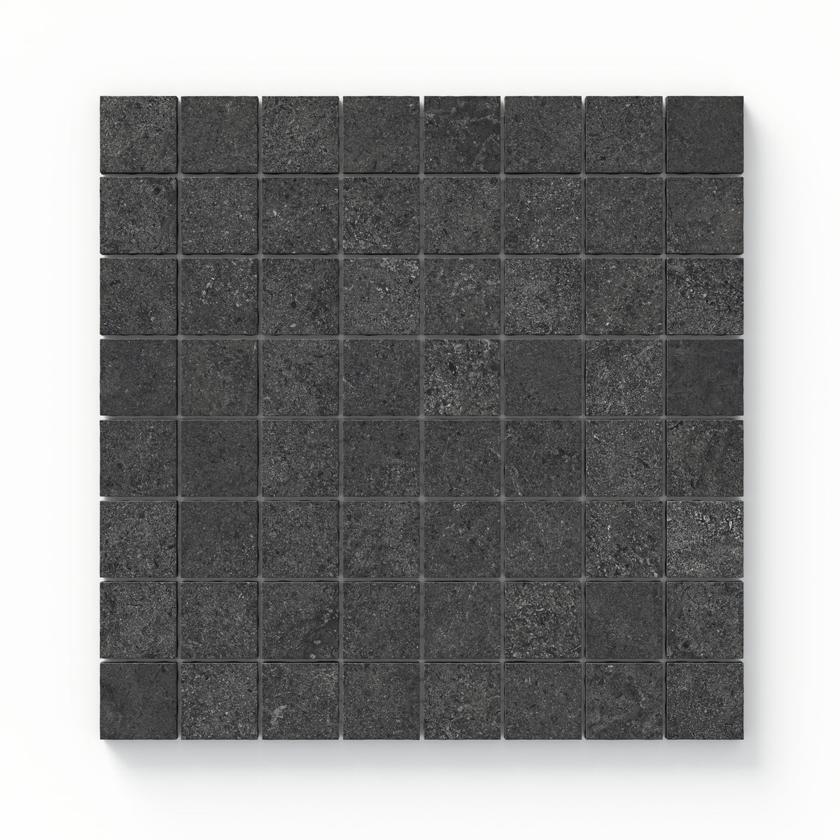 A close-up of Adeline Midnight 1.5x1.5 Matte mosaic tiles, showcasing their deep black tone, textured surface, and seamless grid arrangement.