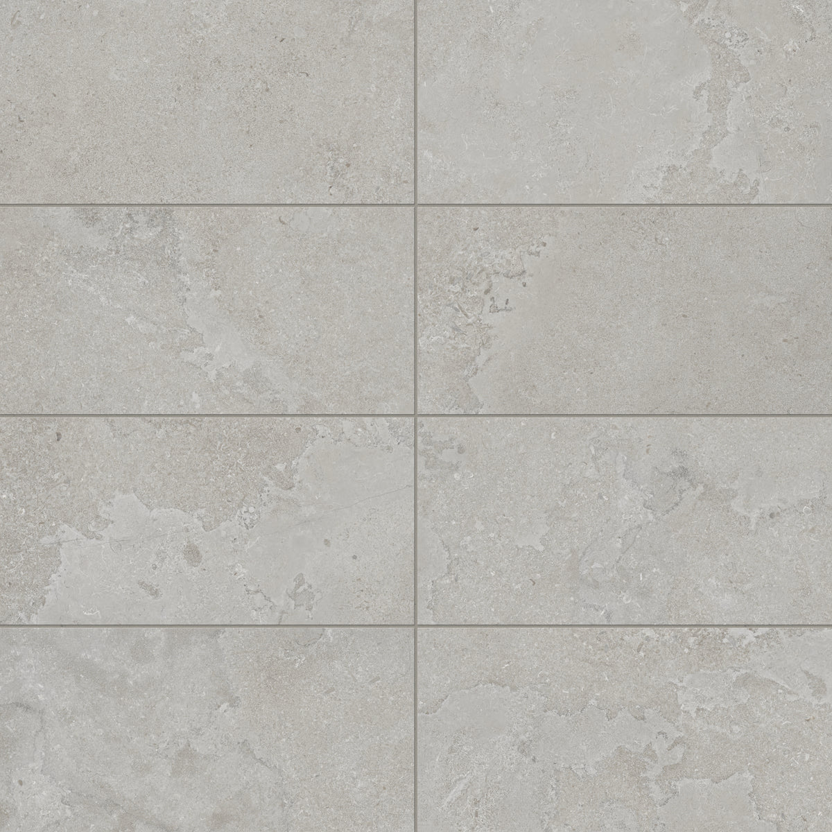 Sophisticated 12x24 matte porcelain tile in a soft taupe shade with cross-cut detailing, offering a natural stone-inspired look for versatile designs.