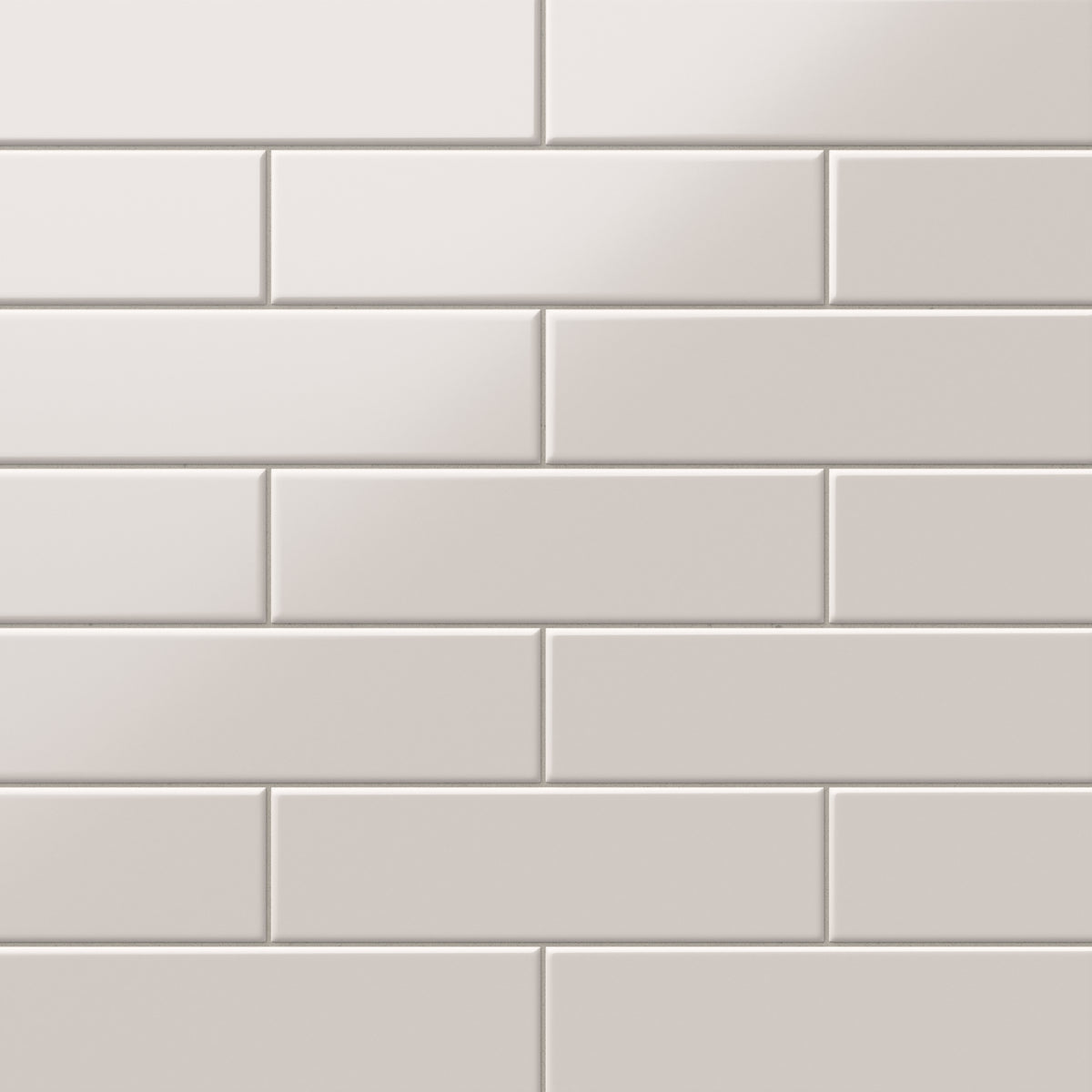 Polly Beige 3x10 satin ceramic tiles offer a soft, matte finish with a neutral tone, ideal for creating timeless, understated elegance in any space.