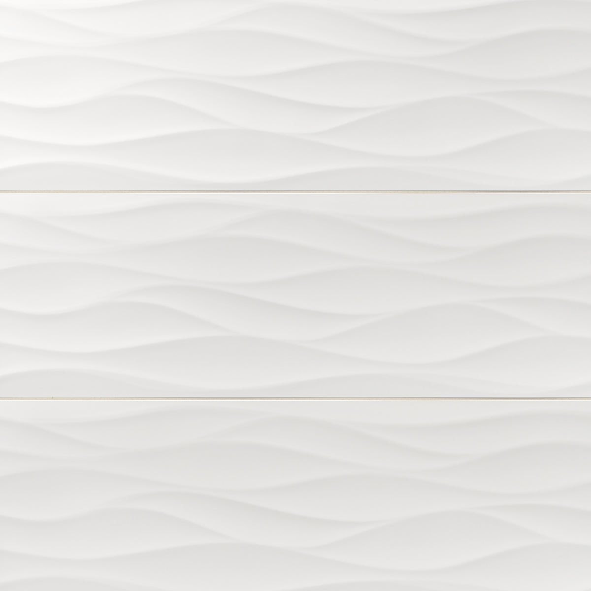 Zayne 12x36 matte ceramic tile in Waves features a calming wave-like texture and matte white finish, adding elegance and fluidity to modern interiors.