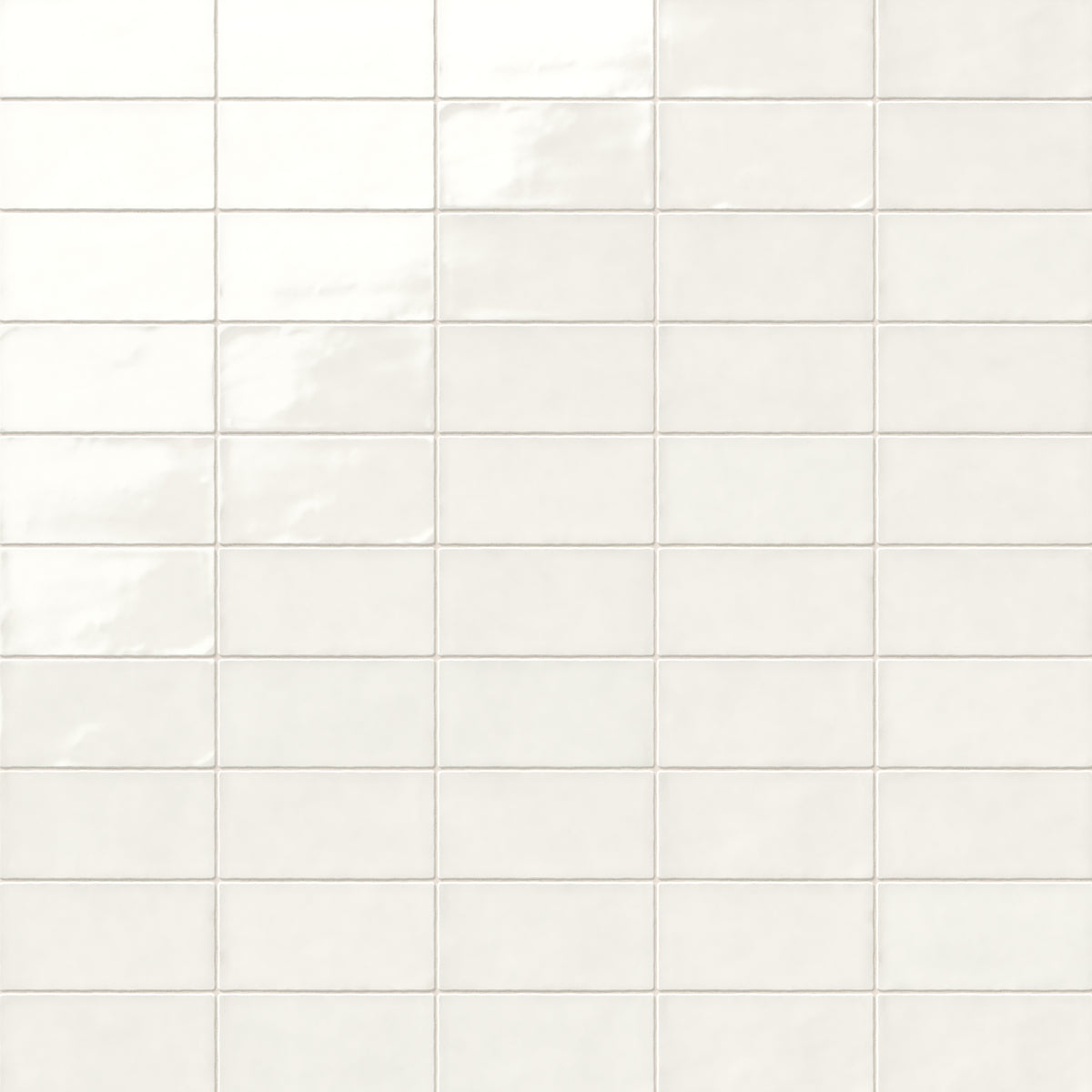 Mikayla soft white ceramic subway tiles with a glossy sheen, offering a versatile and elegant look for timeless interiors