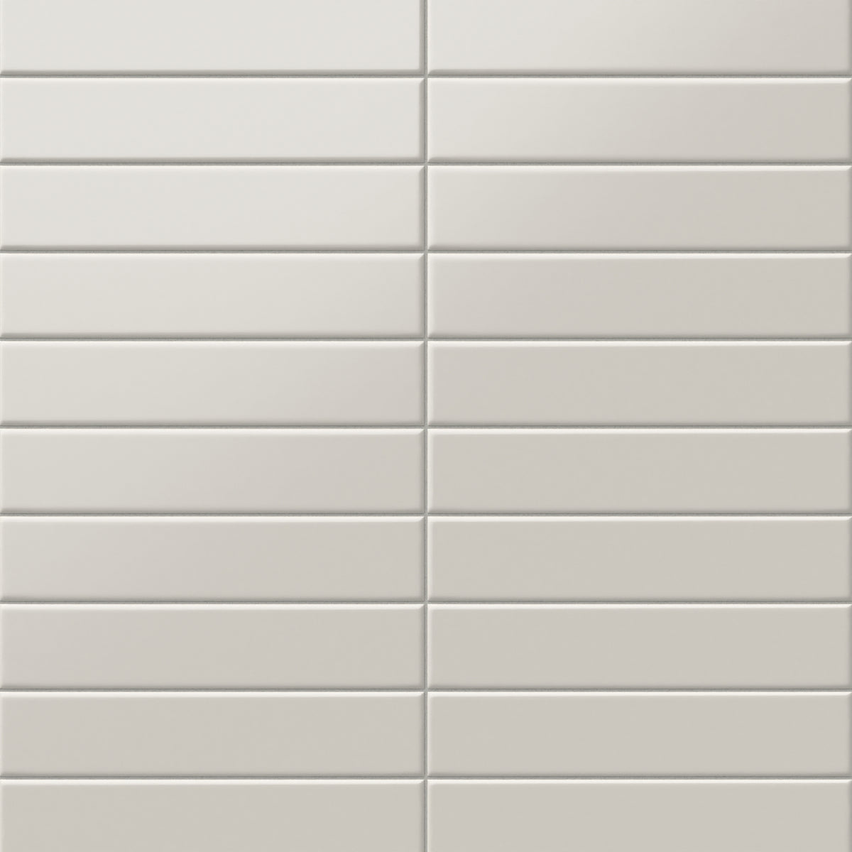 Matte beige subway tiles in a classic 2x10-inch format, providing a soft, neutral tone ideal for contemporary or transitional designs.