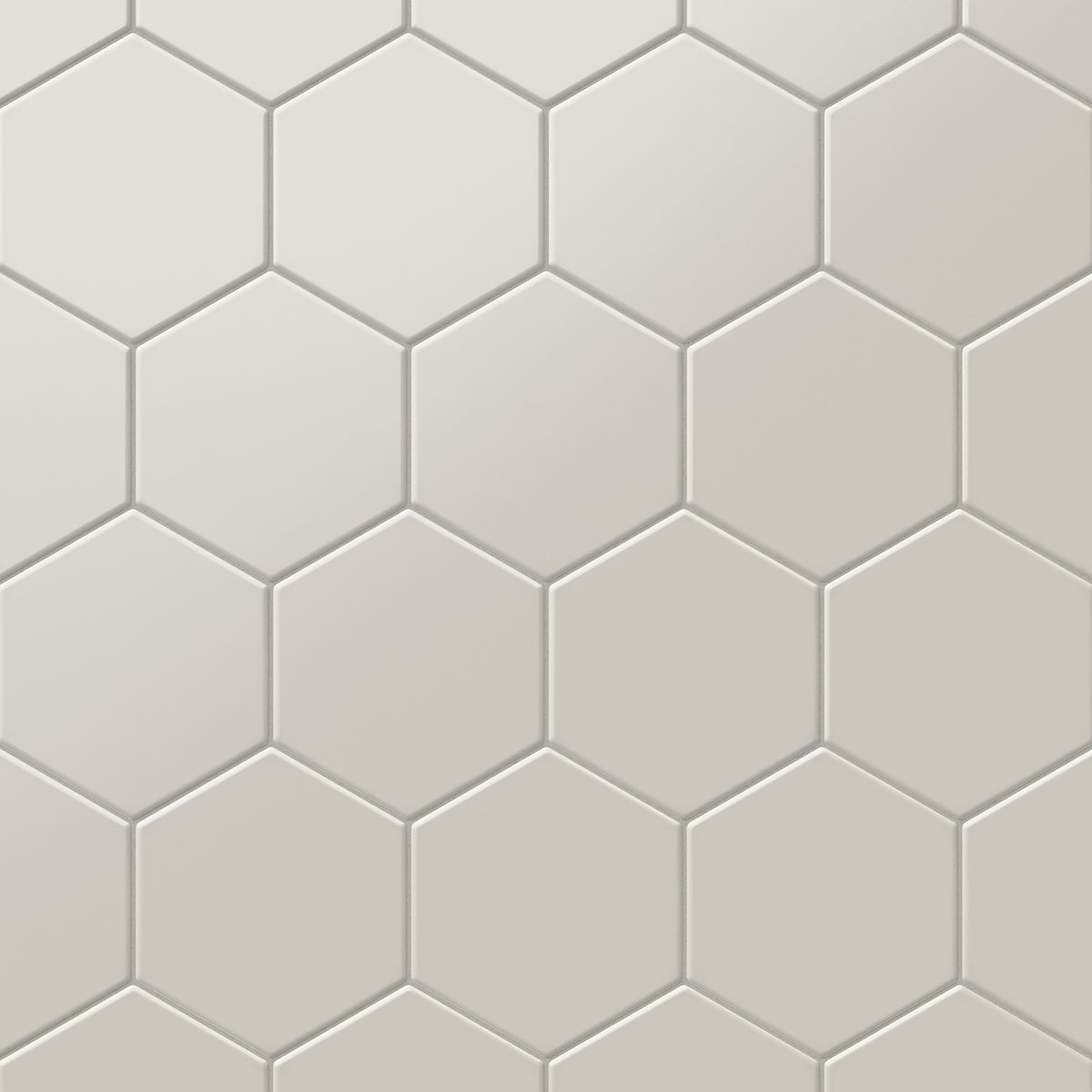 Matte beige hexagon tiles in a 5x6-inch format, delivering a soft and modern geometric pattern for versatile interior designs.