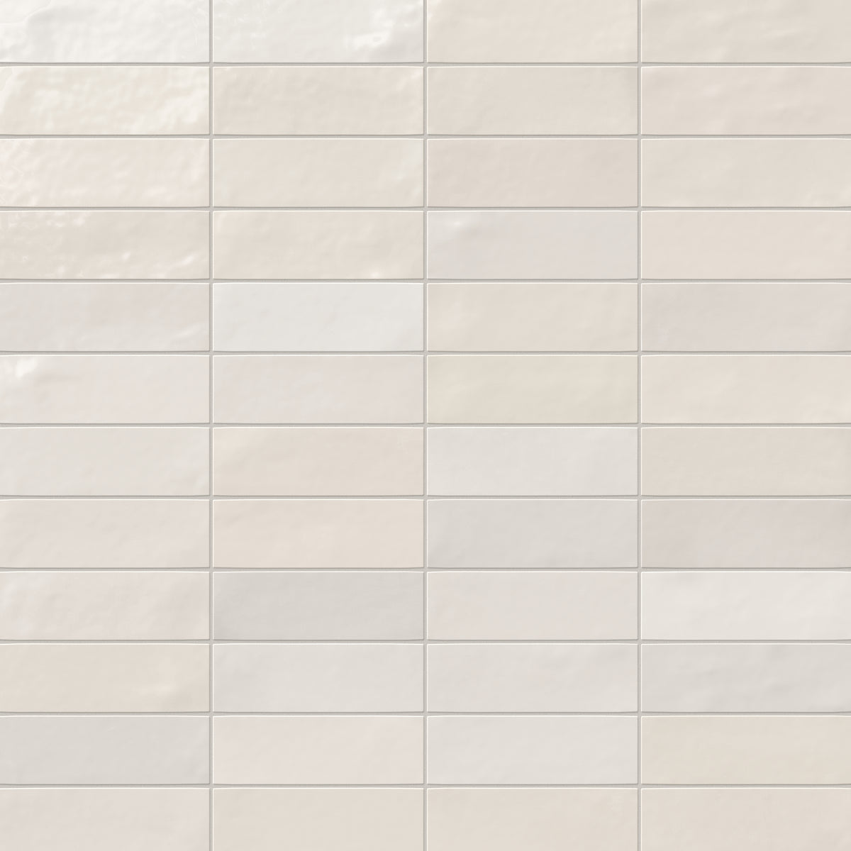 Jojo subway tile in Ivory arranged in a horizontal stacked layout, highlighting its glossy finish and contemporary style