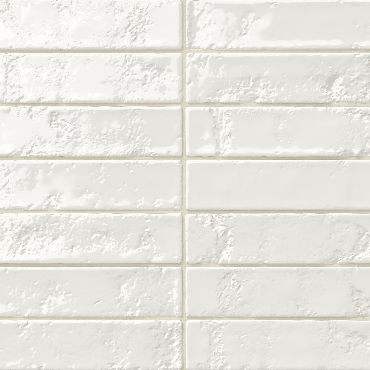 Glossy white 2x10 ceramic subway tile with a slightly textured, uneven surface that adds depth and handcrafted character to the finish.