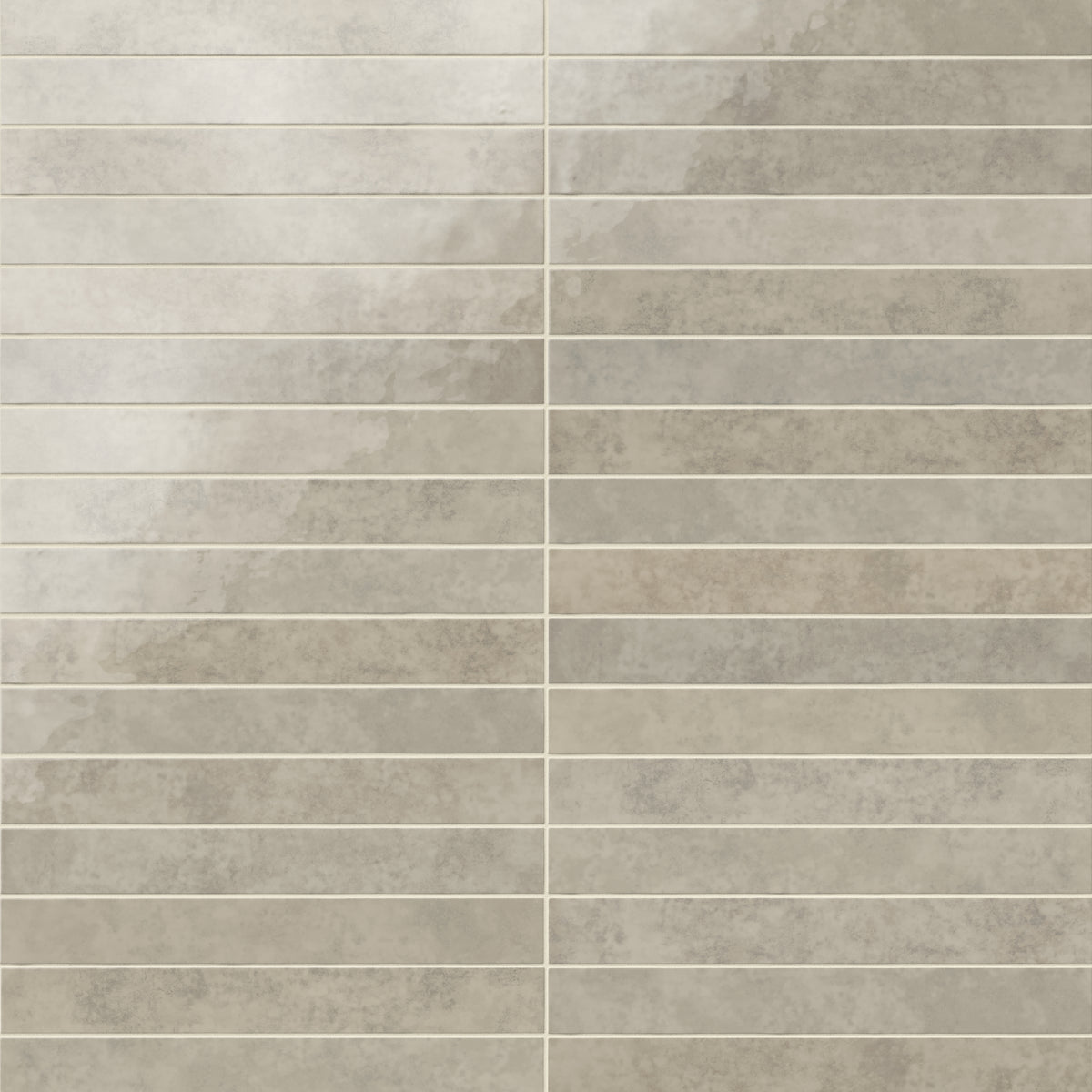 Rectangular porcelain wall tile in a glossy finish with a smooth, lightly textured surface, featuring a warm light gray color with subtle natural variation.