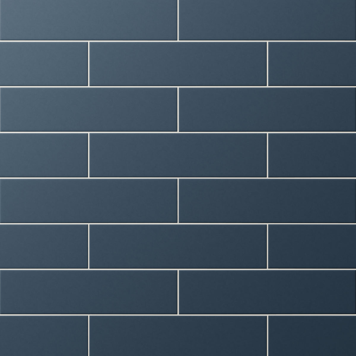 Matte navy blue subway tiles in a classic offset pattern, offering rich depth and modern sophistication to interior walls.