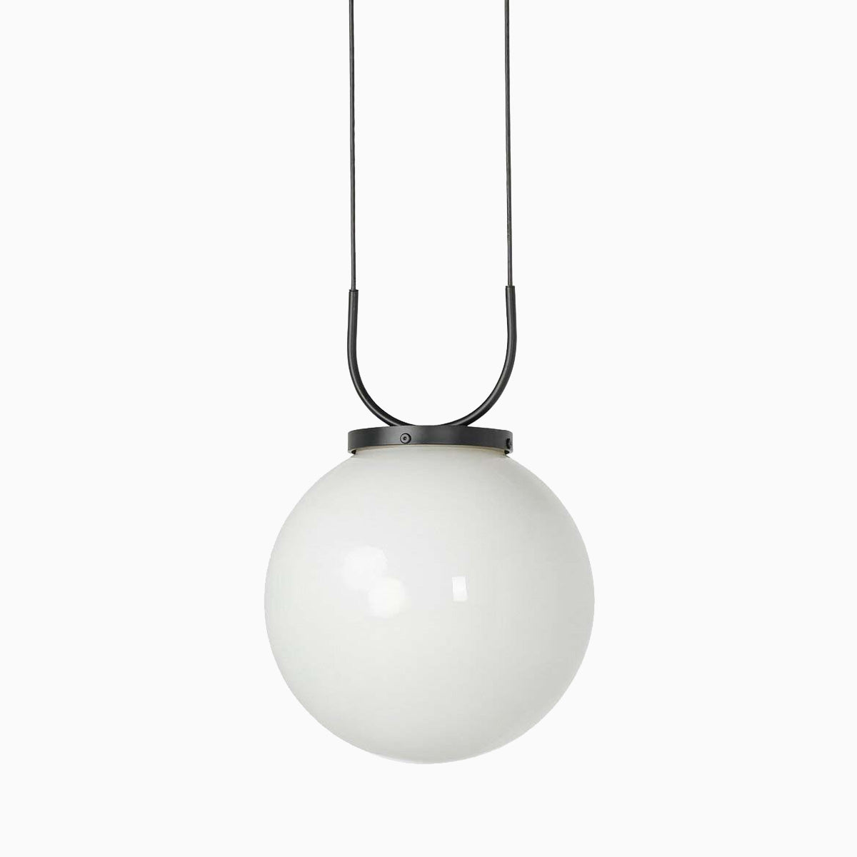 Contemporary pendant light with a white glass globe suspended by a matte black U-shaped bracket and twin cords from the ceiling.