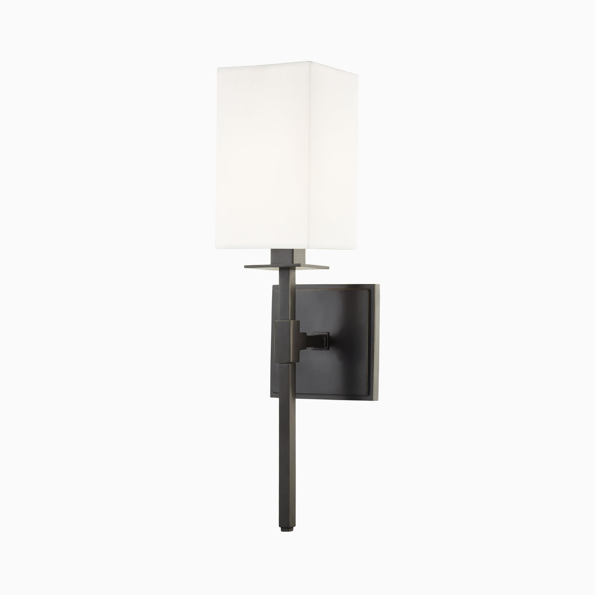 Our Lockhart Wall Sconce in Old Bronze features a white linen box shade with a matte black frame and clean square backplate, offering contrast and sculptural balance.