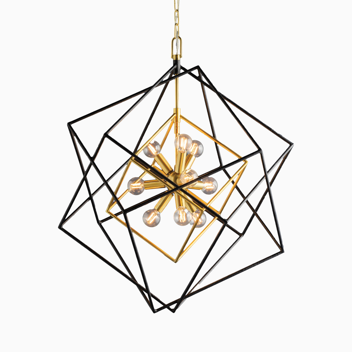 Modern geometric chandelier with intersecting black frames, featuring an aged brass central hub and exposed bulbs in a starburst design.