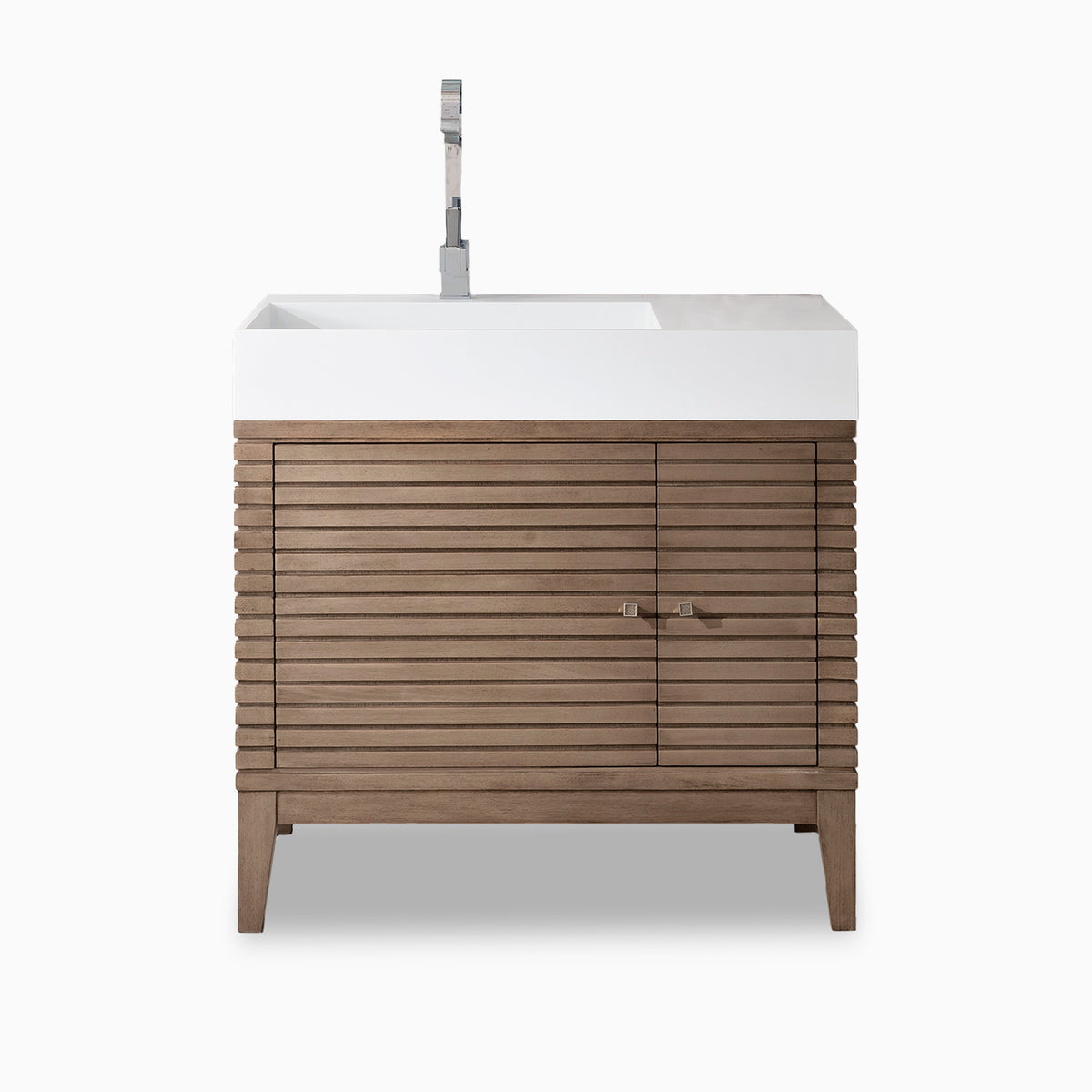 Horizontal slatted cabinetry in Whitewashed Walnut shapes the Easton 36 inch single vanity with cabinet storage and a glossy white composite stone countertop.