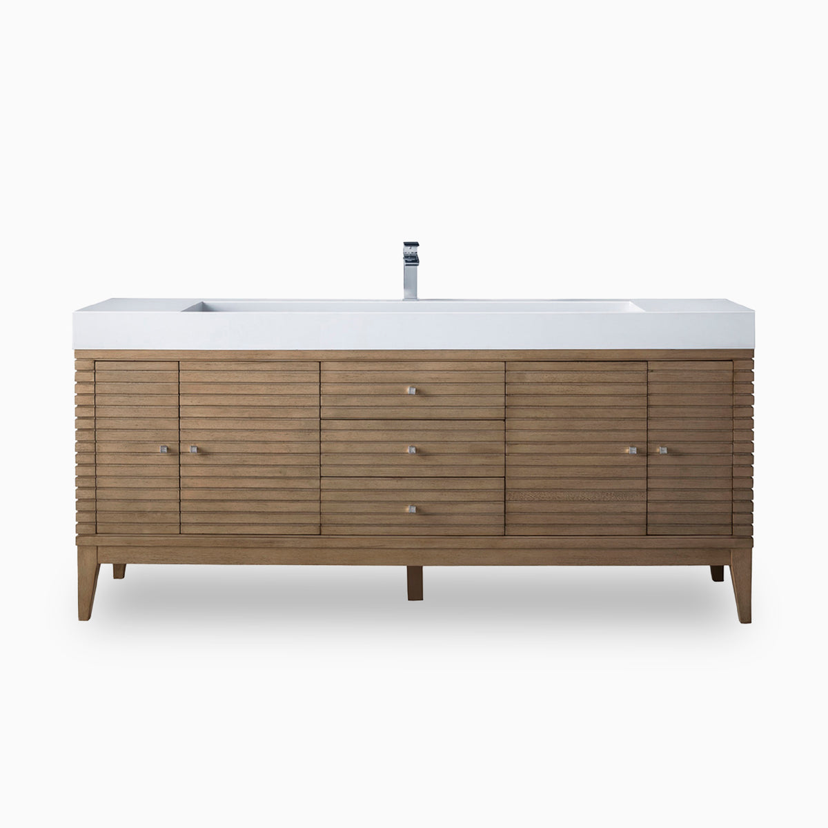 Natural Whitewashed Walnut wood shapes the Easton 72 inch single vanity, designed with horizontal slatted panels, center drawers, and a glossy white composite stone countertop.