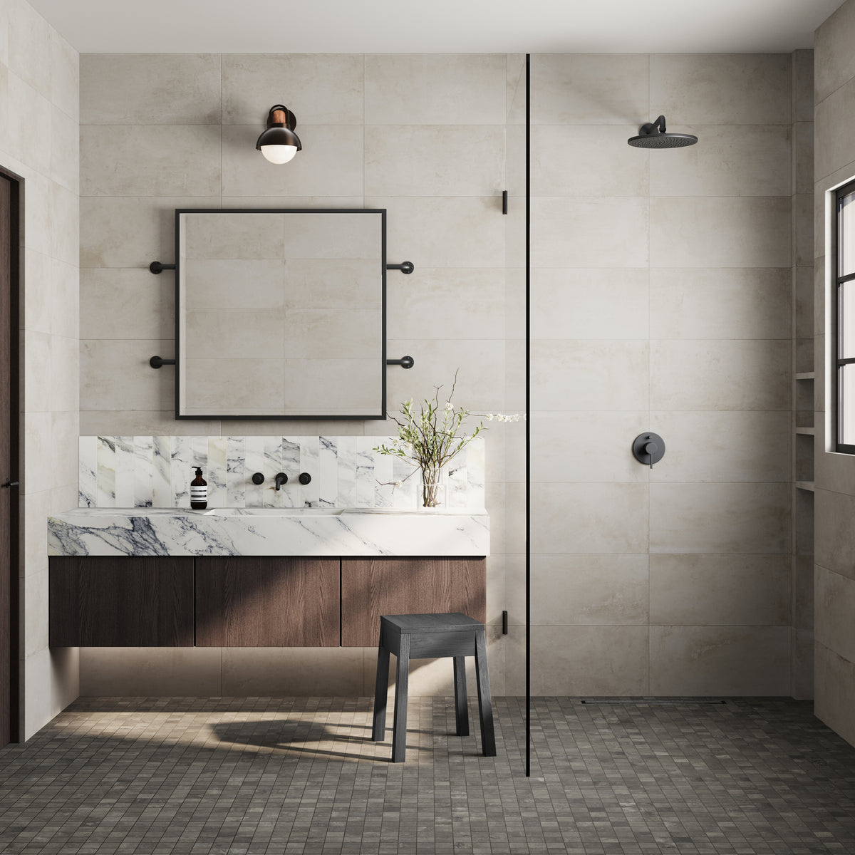 Elegant bathroom featuring 12x24 matte tiles in soft neutral tones, complemented by a mosaic floor and marble vanity