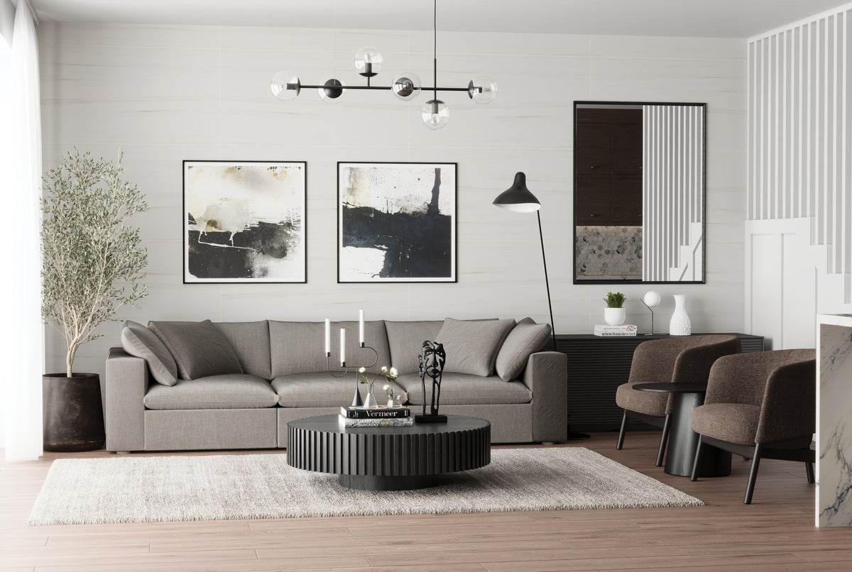 Matte tiles with a size of 24x48 in white create a serene backdrop, complemented by warm wood floors, abstract art, and minimalist furnishings.