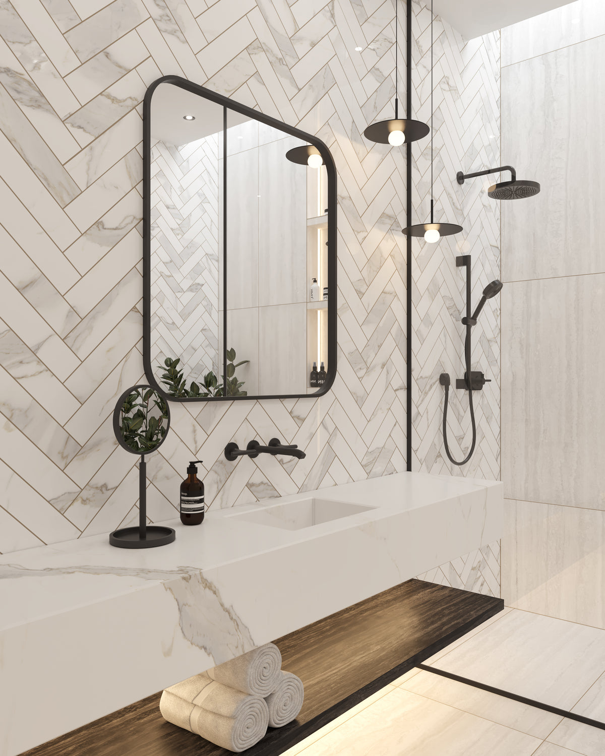 Elegant bathroom featuring polished herringbone marble look tiles, a sleek floating vanity, black fixtures, and soft under-shelf lighting.