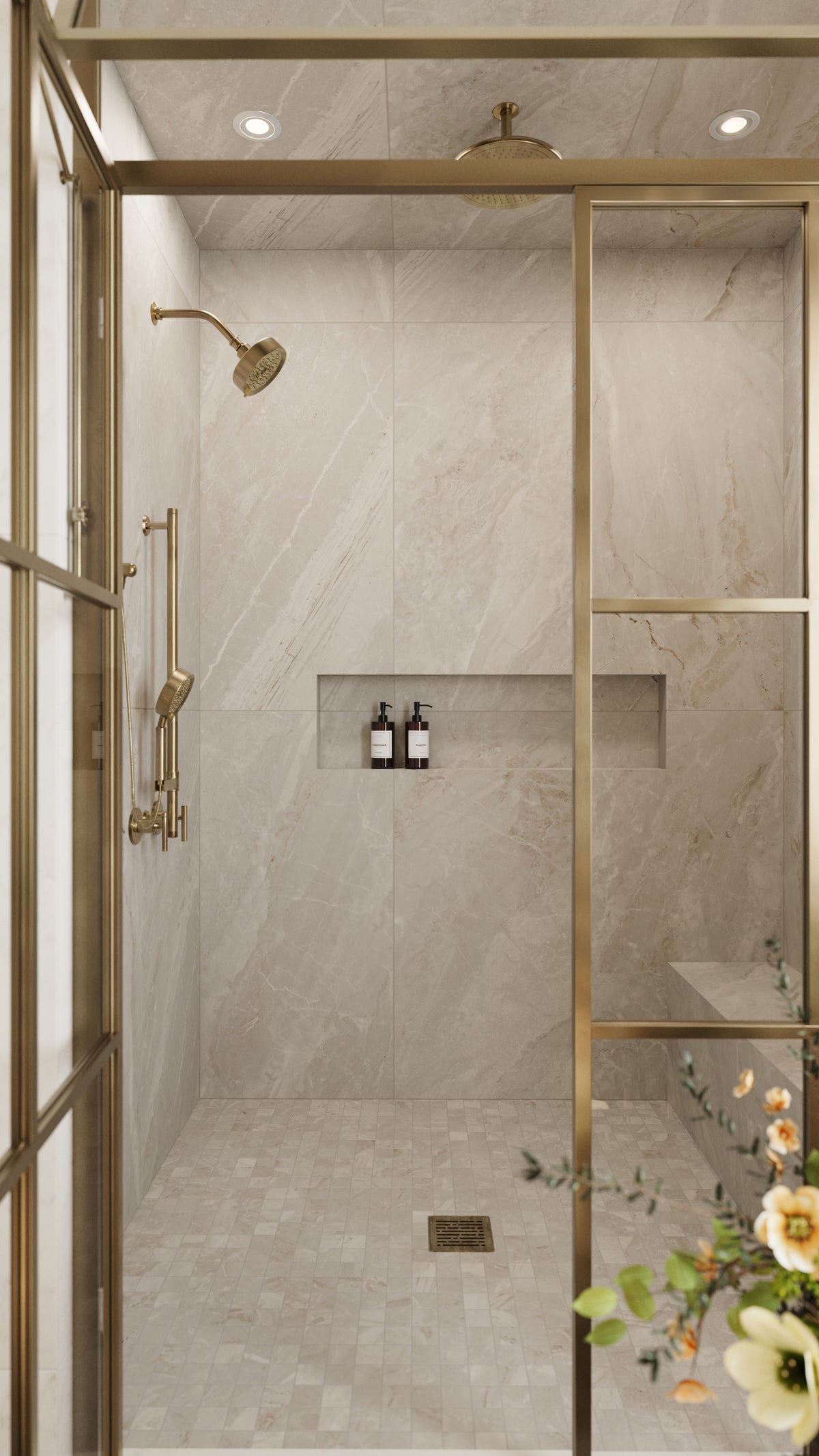 Luxurious shower featuring matte Oniciata Beige tiles in a 24x48-inch size, paired with brass accents and a spa-like ambiance.