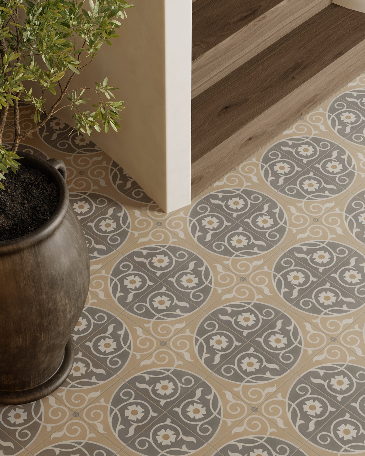 Stair landing with potted plant and flooring featuring Brielle Florian 8x8 matte porcelain tiles in gray and beige floral pattern.