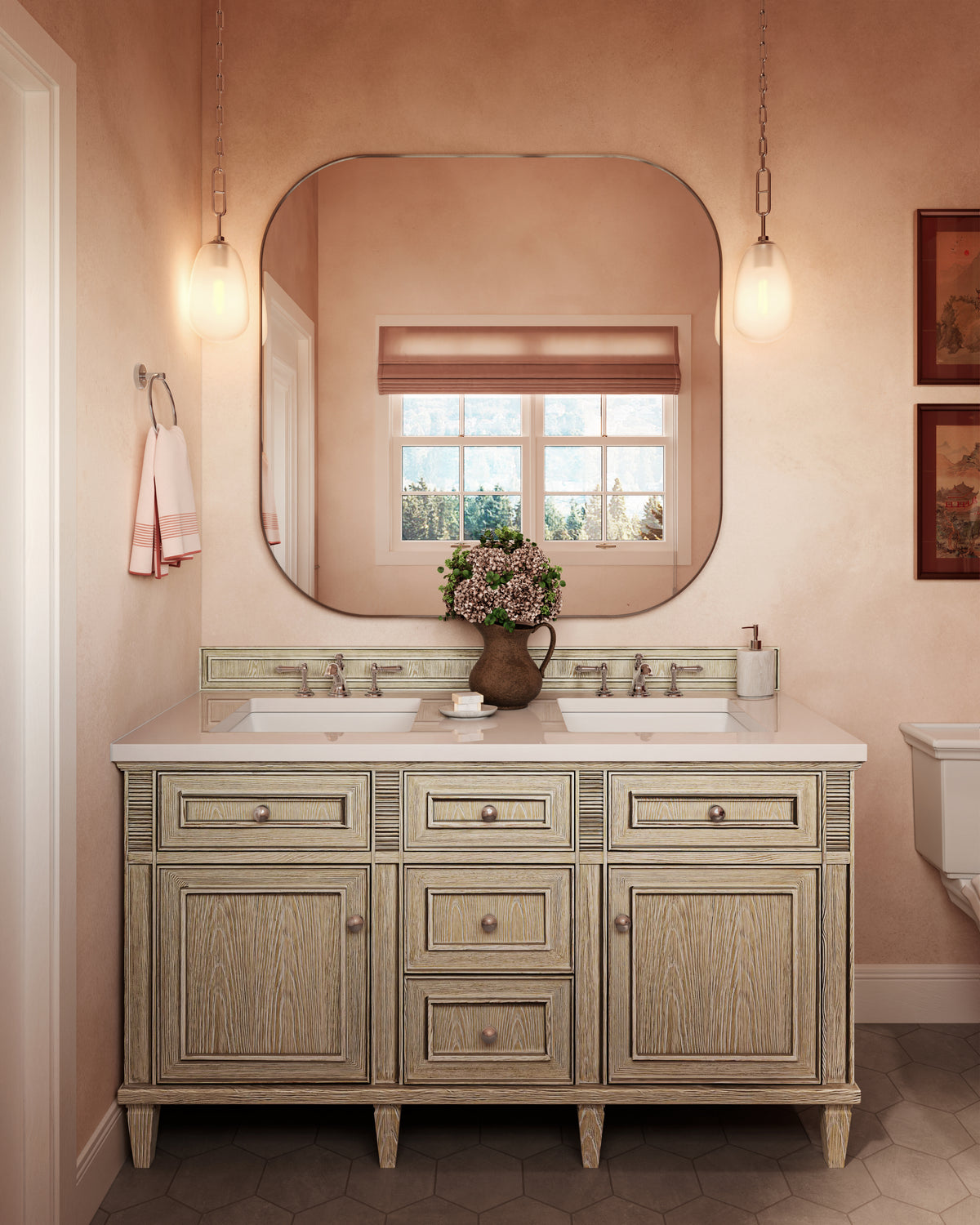 Elodie 60-inch double vanity in whitewashed oak with White Zeus quartz countertop, featuring two sinks, a large rounded mirror, and warm pendant lighting in a soft peach-toned bathroom.