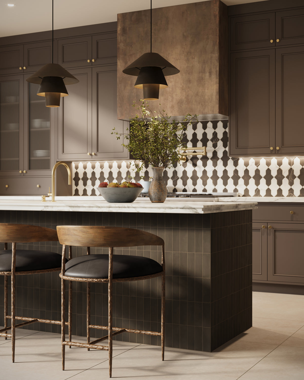 Modern kitchen with dark cabinetry, marble island, black pendant lights, patterned tile backsplash, and brass faucet over a spacious island
