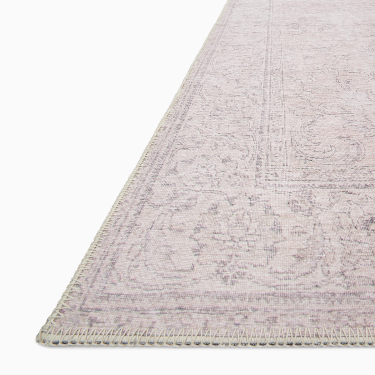 Pascal Polyester Face Rug in Taupe, blending warm taupe hues with a delicate faded pattern, ideal for classic and sophisticated interiors.