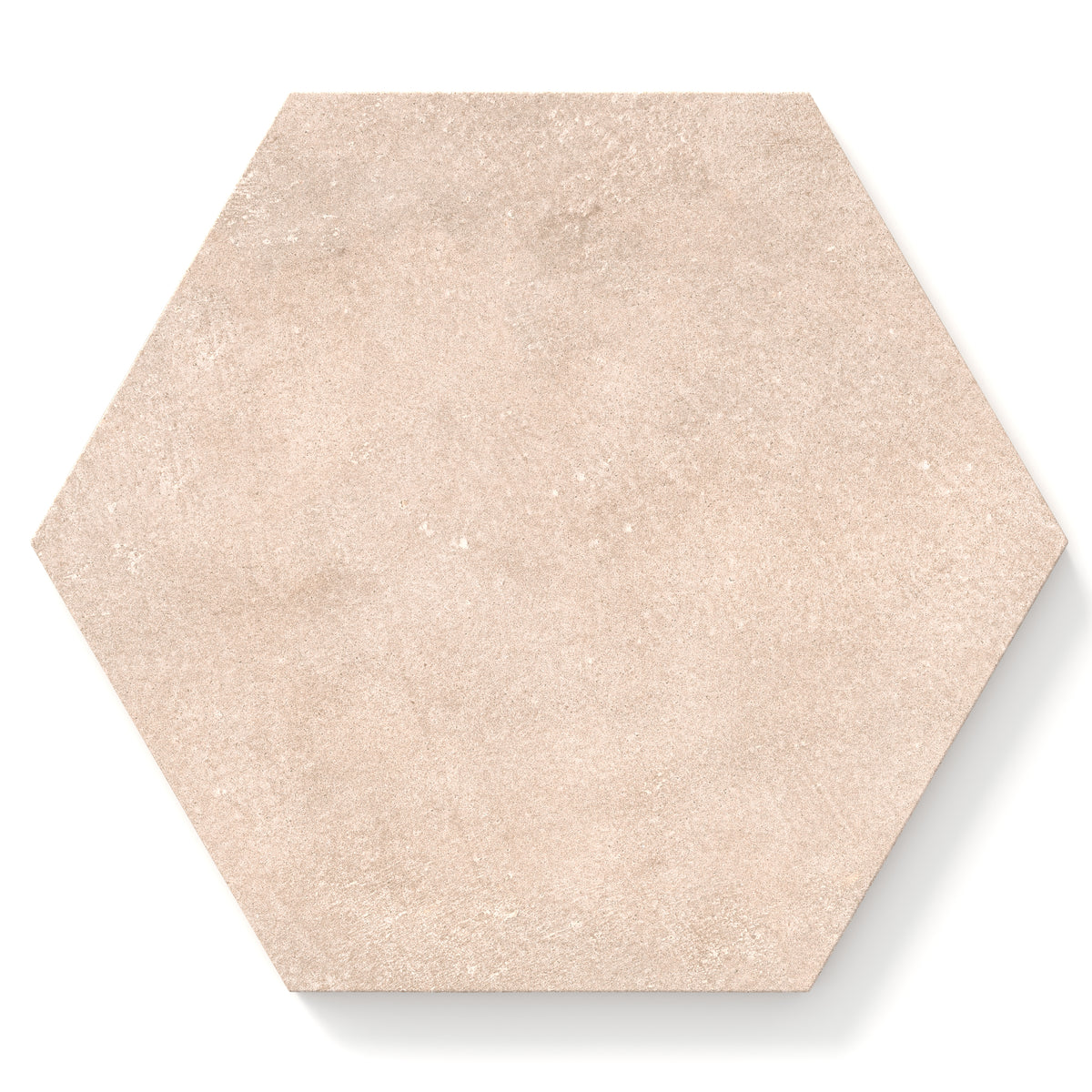 Hexagon porcelain tile in a matte finish with a smooth, lightly textured surface, featuring a warm beige color with soft natural variation and subtle speckling.