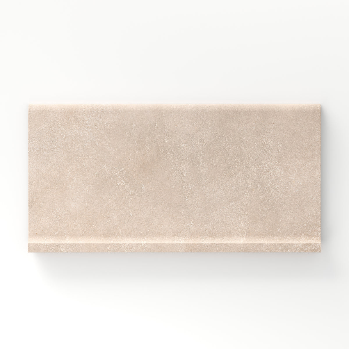 Rectangular porcelain cove base tile in a matte finish with a smooth, lightly textured surface, featuring a light warm beige color with soft natural variation.
