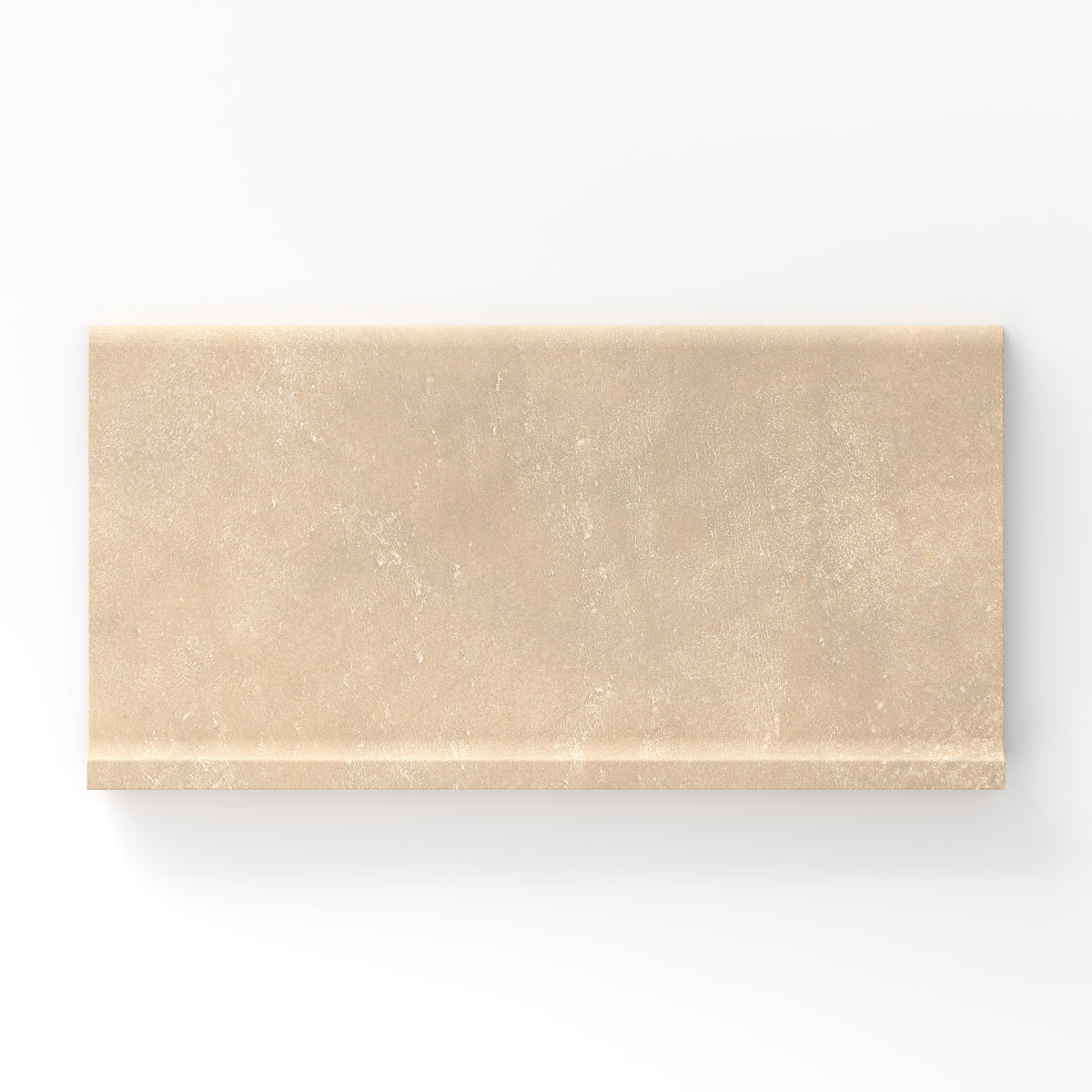 Rectangular porcelain cove base tile in a matte finish with a smooth, lightly textured surface, featuring a soft warm beige color with gentle natural variation.