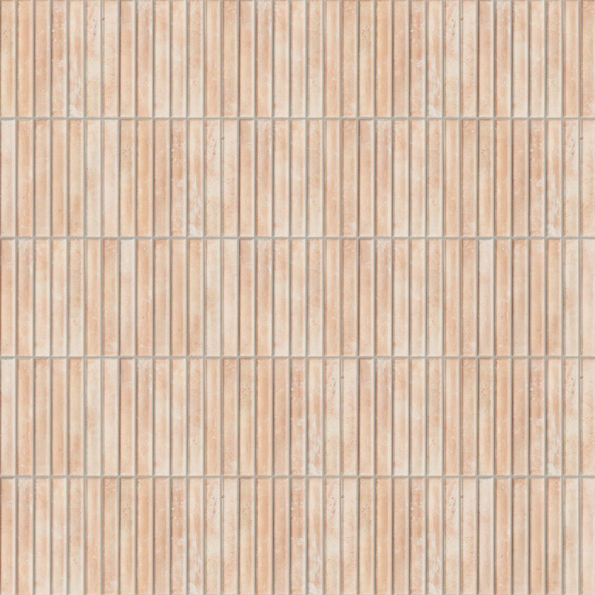 Kitkat mosaic-look tile in indulgent light orange tone with an earthy matte finish and mineral- and clay-inspired tonal variation.