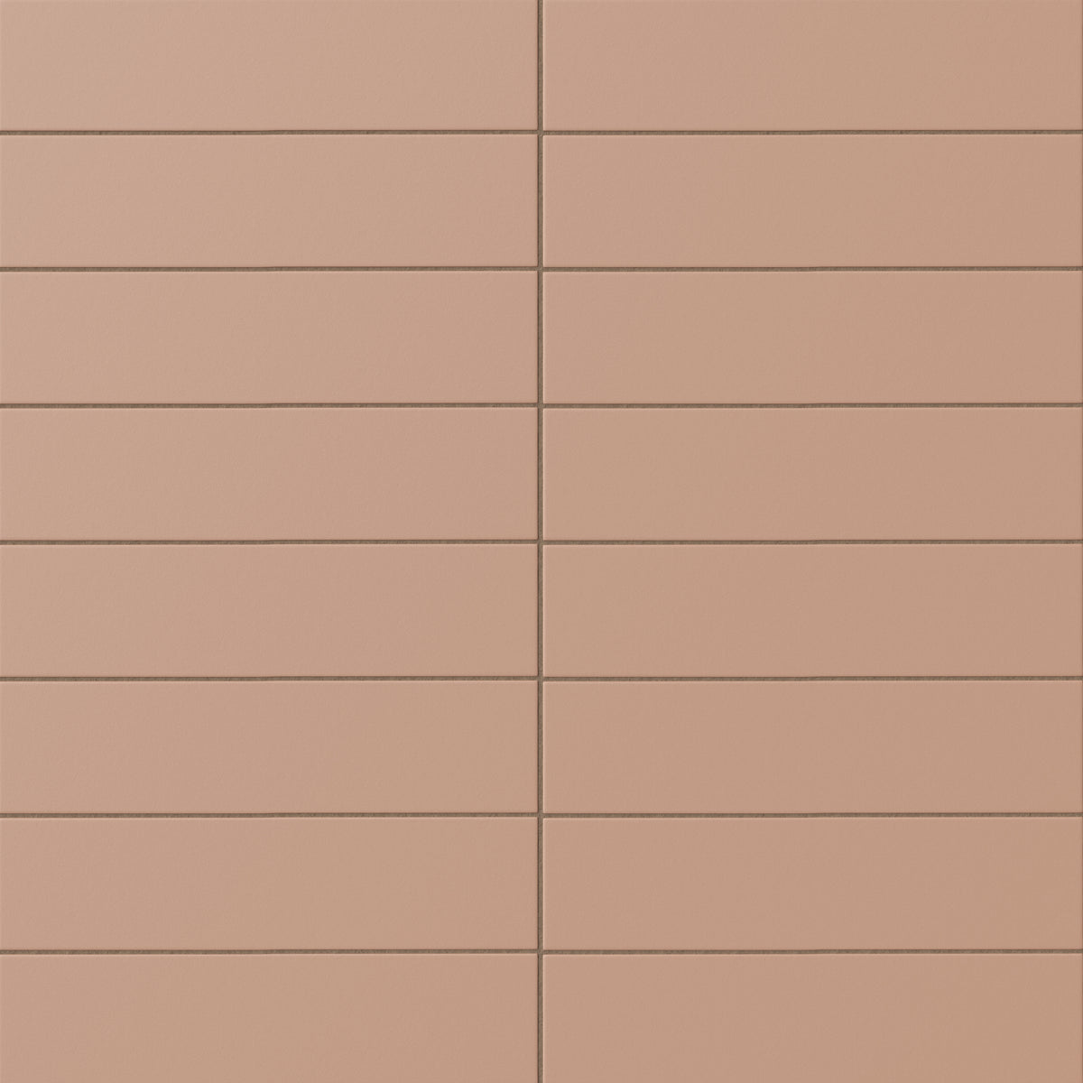 Matte subway tile in a dusty terracotta blush tone with a flat rectangular design, earthy pink-orange warmth, subtle surface texture, and clean linear grout lines.