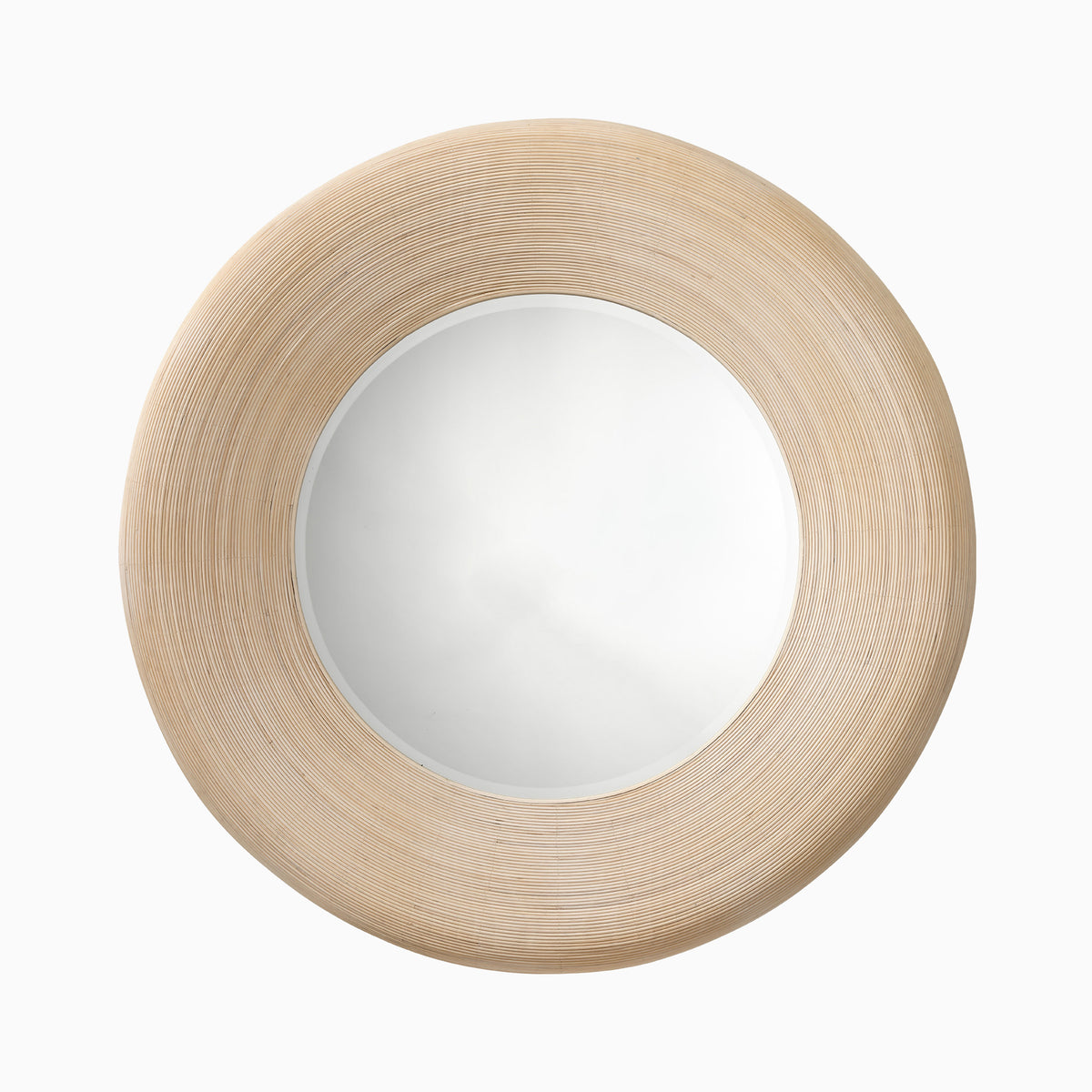 Round Meliora mirror with a cream bamboo frame featuring fine concentric grooves and a warm beige finish for a light, organic look.