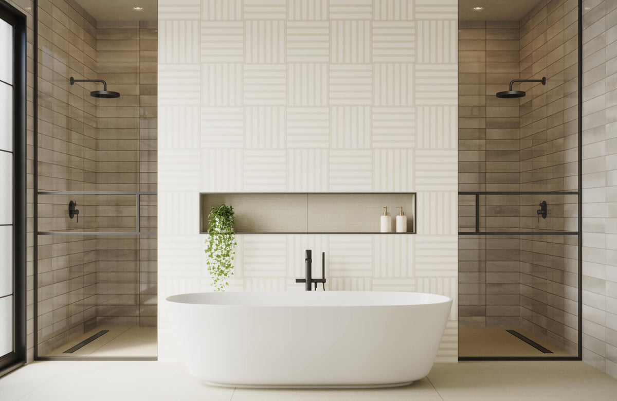 Graphic striped decorative wall tile behind a modern tub flanked by twin showers for a bold focal-point design.