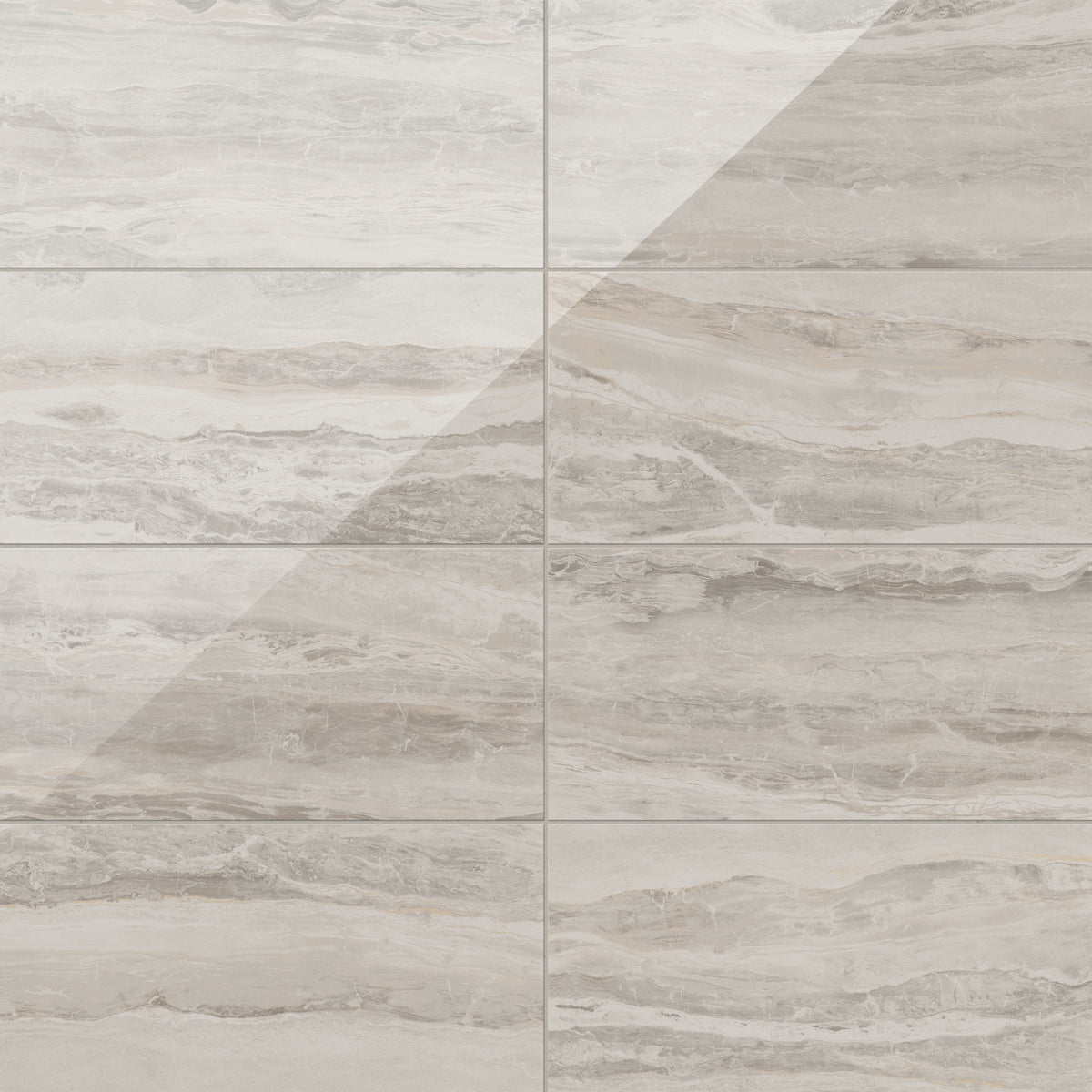 Large 12x24 tiles in polished brown, highlighted by intricate natural veining, create a timeless and graceful aesthetic, perfect for elevating any interior.